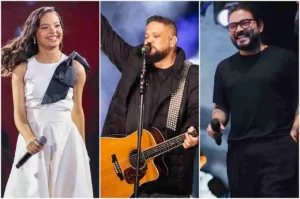 Cantores gospel se apresentando ao vivo em palco iluminado durante evento de música cristã.