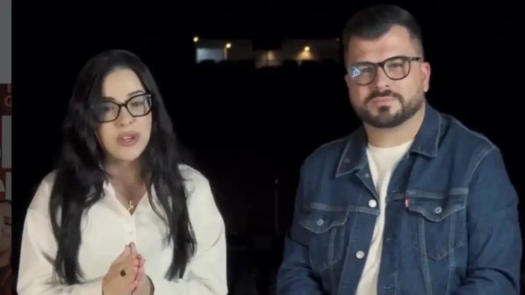 Pastores Rafaela e André Marques, da Igreja Lagoinha Paulínia, em gravação de vídeo com fundo escuro